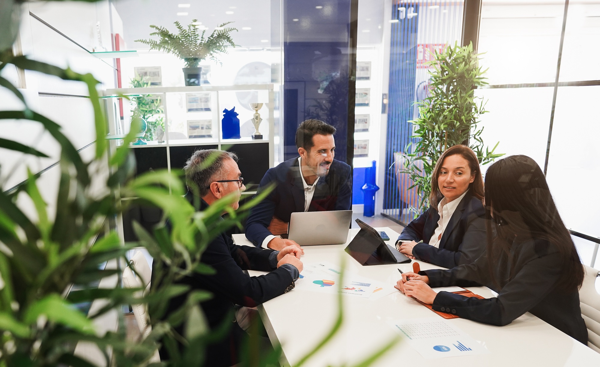 Business entrepreneurs working inside real estate agency